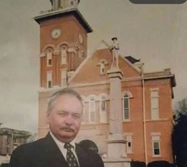 Sheriff Hannan stands for a photo in front of the Bibb County Courthouse in Centreville, AL.