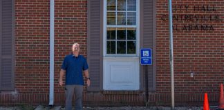 Centreville Mayor Terry Morton stands outside the City Hall window that will become the new drive-thru.